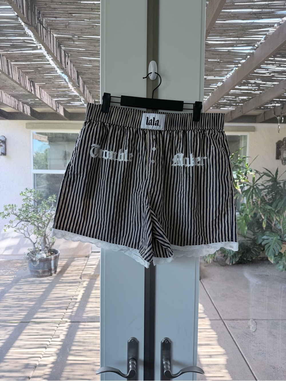 Dressed in LALA Black and White Striped Lace-Trim Athletic Shorts